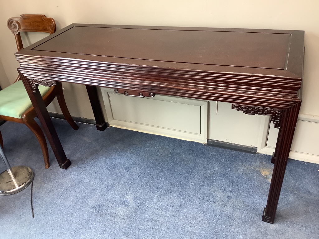 A 20th century Chinese hardwood side or serving table, width 140cm depth 52cm height 84cm